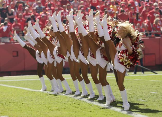 Kansas City Chiefs cheerleaders perform in the second half of an NFL football game between the Chiefs and the Tennessee Titans in Kansas City, Mo., Sunday, Sept. 7, 2014. (AP Photo/Charlie Riedel)