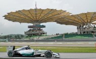 Mercedes driver Nico Rosberg of Germany returns to the pits during the third practice session of the Formula One Malaysian Grand Prix in Sepang on March 29, 2014
