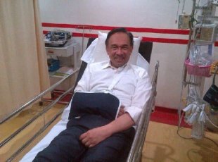 Anwar is all smiles again after receiving treatment and having his right arm put in a sling due to the fracture. – May 13, 2014.