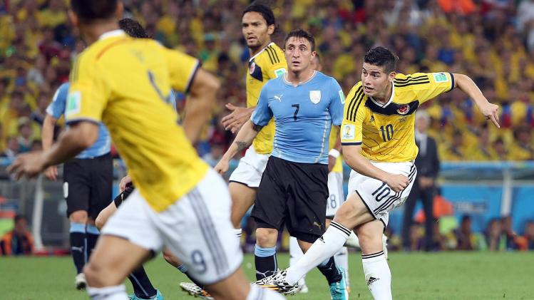 World Cup - Rodriguez genius fires Colombia past toothless Uruguay