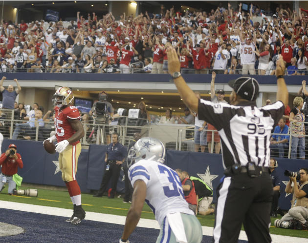 San Francisco 49ers tight end Vernon Davis (85) scores a touchdown during the first half of an NFL football game against the Dallas Cowboys Sunday, Sept. 7, 2014, in Arlington, Texas. (AP Photo/LM Ote