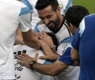 Argentina's forward Ezequiel Lavezzi (C top) jokes with midfielder Lucas Biglia during a training session at "Cidade do Galo" in Vespasiano on July 2, 2014 ahead their 2014 FIFA World Cup Brazil quarterfinals football match against Belgium