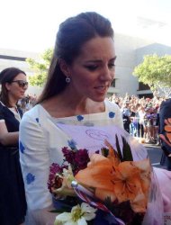 The Duchess of Cambridge in a blue print dress in April 2014