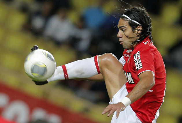 FILE - This is a Friday, Nov. 8, 2013 file photo of Monaco's Radamel Falcao of Colombia as he controls the ball during his French League One soccer match against Evian, in Monaco stadium. Radamel Falc