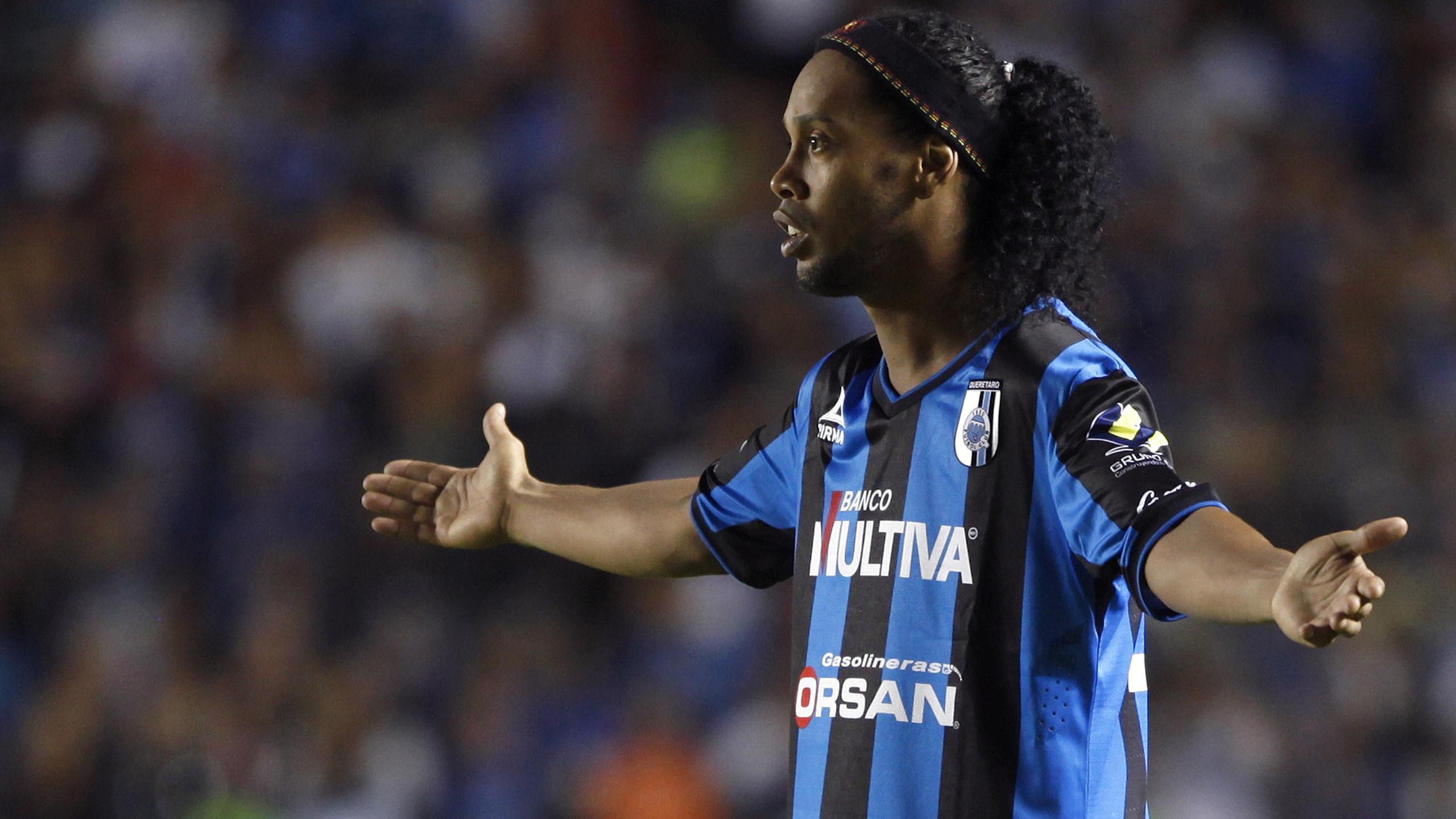 Queretaro&amp;#39;s Ronaldinho gestures during a Copa MX soccer match against Tigres at the Corregidora stadium in Queretaro (Reuters)