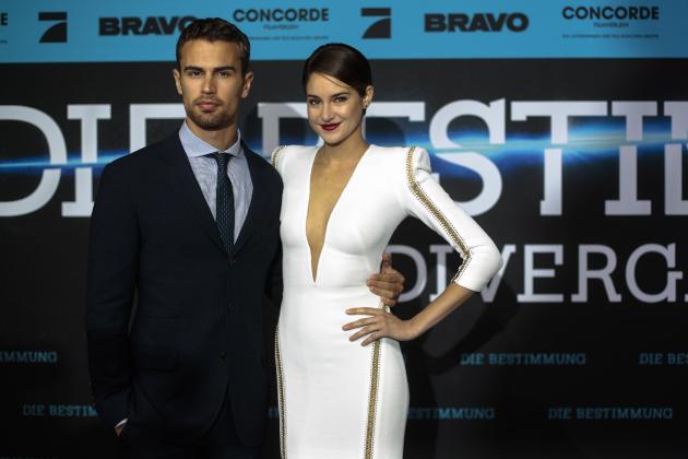 British actor Theo James and U.S actress Shailene Woodley arrive for the German film premiere of "Divergent" in Berlin, Tuesday, April 1, 2014. (AP Photo/Markus Schreiber)