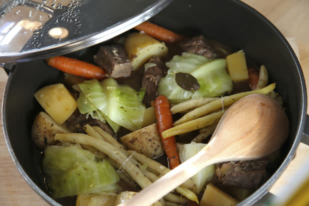 According to the this classic French dish, translated as “pot on the fire,” is actually two dishes in one. It consists of a hearty beef broth as well as the meats and vegetables that are braised in it