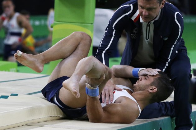 France&amp;#39;s Samir Ait Said holds his leg after injuring it while performing on the vault during the artistic gymnastics men&amp;#39;s qualification at the 2016 Summer Olympics in Rio de Janeiro, Brazil, Saturday, Aug. 6, 2016. (AP Photo/Rebecca Blackwell)