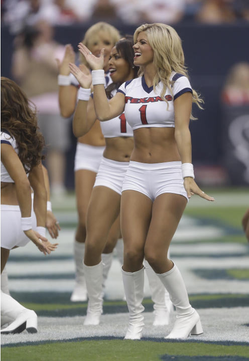 The Houston Texans cheerleaders perform during the second quarter of an NFL football game Sunday, Sept. 7, 2014, in Houston. (AP Photo/Patric Schneider)