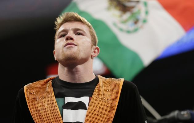 Canelo Alvarez, of Mexico, enters the ring prior to his super welterweight fight against Erislandy Lara, Saturday, July 12, 2014, in Las Vegas
