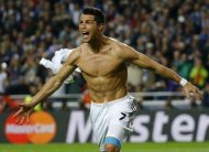 Real Madrid's Cristiano Ronaldo celebrates after scoring a penalty against Atletico Madrid during their Champions League final soccer match at the Luz Stadium in Lisbon May 24, 2014. REUTERS/Kai Pfaffenbach