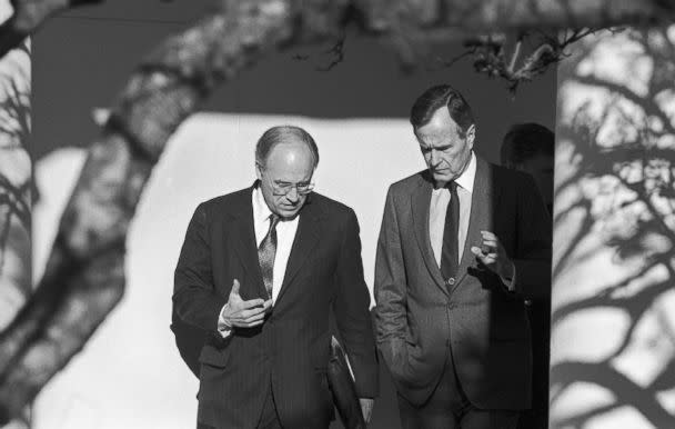 PHOTO: President George H.W. Bush and Secretary of Defense Dick Cheney discuss the run up to Operation Desert Storm as they walk near the Rose Garden at the White House, 1991. (David Hume Kennerly/Getty Images, file)