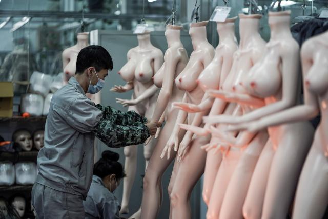 TOPSHOT - EDITORS NOTE: Graphic content / This photo taken on February 1, 2018 shows a worker preparing silicone dolls at a factory of EXDOLL, a firm based in the northeastern Chinese port city of Dalian. With China facing a massive gender gap and a greying population, a company wants to hook up lonely men and retirees with a new kind of companion: 