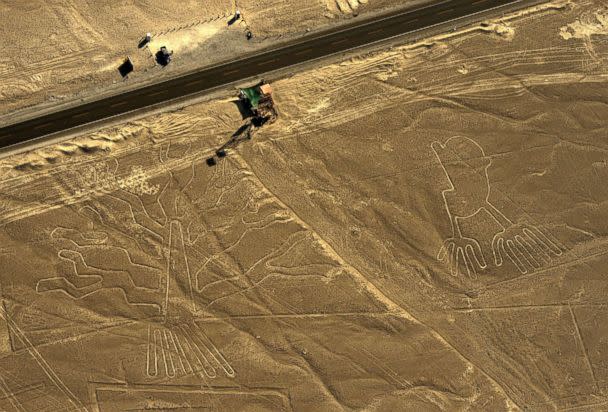 PHOTO: An aerial view of geoglyphs representing a guarango tree (L) and hands are pictured in the Nazca desert, in southern Peru in this Dec. 11, 2014 file photo. (Martin Bernetti/AFP/Getty Images, FILE)