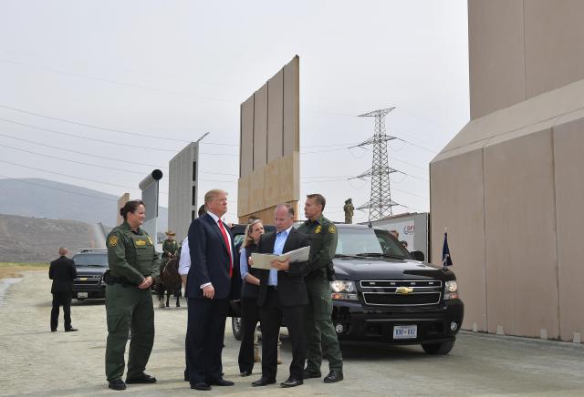 President Donald Trump inspects border wall prototypes in San Diego on March 13.Â  (MANDEL NGAN/AFP via Getty Images)