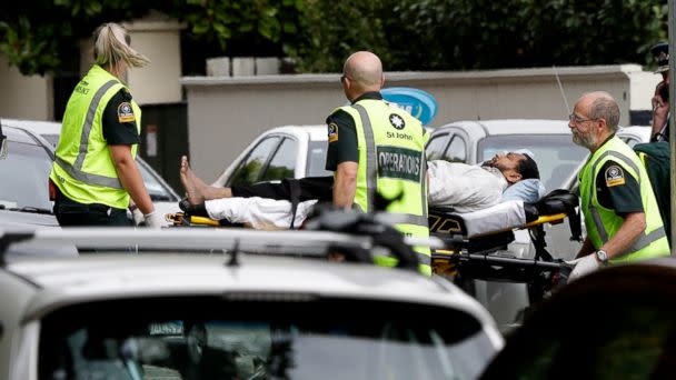 PHOTO: Ambulance staff take a man from outside a mosque in central Christchurch, New Zealand, Friday, March 15, 2019. A witness says many people have been killed in a mass shooting at a mosque in the New Zealand city of Christchurch. (AP)
