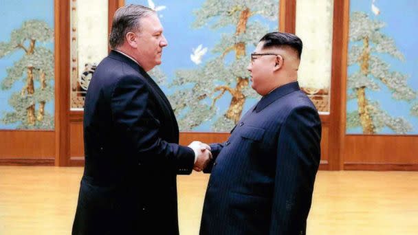 PHOTO: CIA director Mike Pompeo shakes hands with North Korean leader Kim Jong Un in Pyongyang, North Korea, during a 2018 Easter weekend trip in this undated image. (White House via AP)