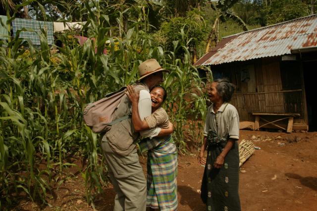 (AUSTRALIA OUT) Archaeologist Douglas Hobbs is greeted by villagers at Liang Bua, the location of the cave where 'hobbit' life was discovered, 27 November 2004. SMH Picture by SAHLAN HAYES (Photo by Fairfax Media/Fairfax Media via Getty Images)