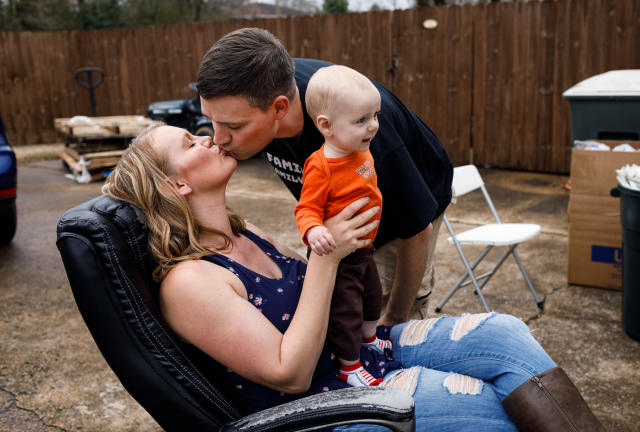 Matt Colvin with his wife, Brittany, and son, Logan, at their home in Hixson, Tenn., March 12, 2020. (Doug Strickland/The New York Times)