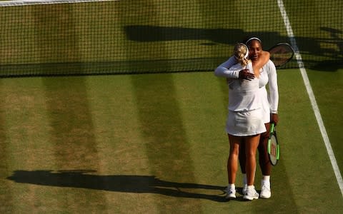Angelique Kerber of Germany (L) embraces Serena Williams of The United States after the Ladies' Singles final on day twelve of the Wimbledon Lawn Tennis Championships at All England Lawn Tennis and Croquet Club on July 14, 2018 in London, England - Credit: Getty Images 