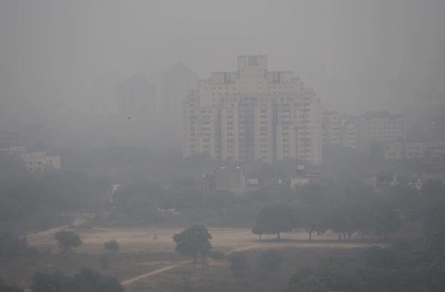 Heavy smog engulfed Gurgaon, India, a city southwest of New Delhi in North India. The air quality index was at 320, which agencies consider unfit for inhalation even by healthy people and which made commuting difficult. December 2017.  (Sanjeev Verma/Hindustan Times via Getty Images)