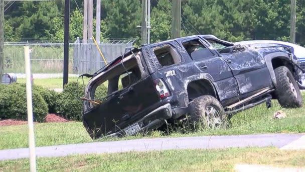 Brittany Jeffords' car sits off the side of the road after she flipped it over while fleeing police in Florence, S.C., on Friday, July 12, 2018. (WPDE)