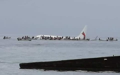 Air Niugini said everyone on board was safely rescued - Credit: Akang San/Reuters