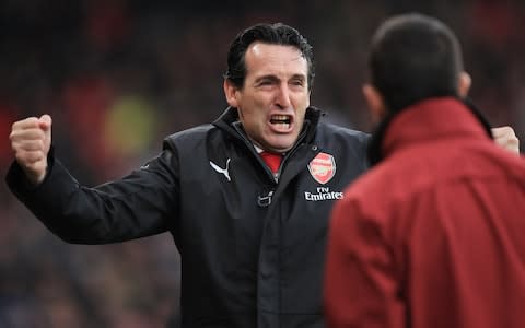 Unai Emery manager of Arsenal celebrates the winning goal during the Premier League match between AFC Bournemouth and Arsenal FC at Vitality Stadium  - Credit: Getty images