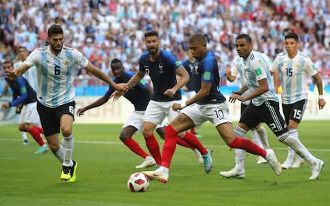 Kylian Mbappe of France scores his team's third goal during the 2018 FIFA World Cup Russia Round of 16 match between France and Argentina at Kazan Arena on June 30, 2018 in Kazan, Russia - Credit: Getty Images
