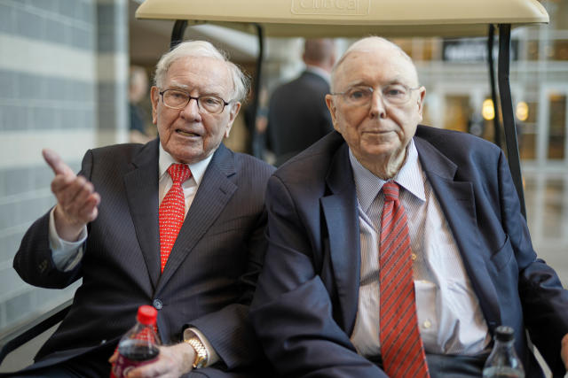 Berkshire Hathaway Chairman and CEO Warren Buffett, left, and Vice Chairman Charlie Munger, briefly chat with reporters Friday, May 3, 2019, one day before Berkshire Hathaway's annual shareholders meeting. An estimated 40,000 people are expected in town for the event, where Buffett and Munger preside over the meeting and spend hours answering questions. (AP Photo/Nati Harnik)
