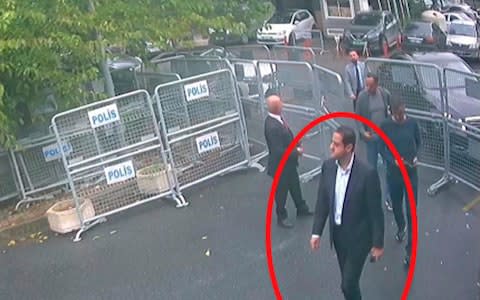 Maher Abdulaziz Mutreb, named by Turkish officials as one of 15 Saudi suspects in the suspected killing of Jamal Khashoggi, is seen (circled). In a still image from surveillance camera footage - Credit: AP
